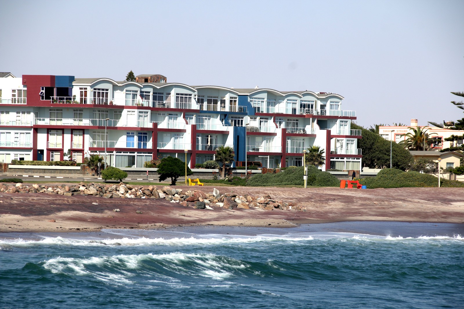 Swakopmund seafront viewed from the jetty in June 2022. Historic documentary photograph.