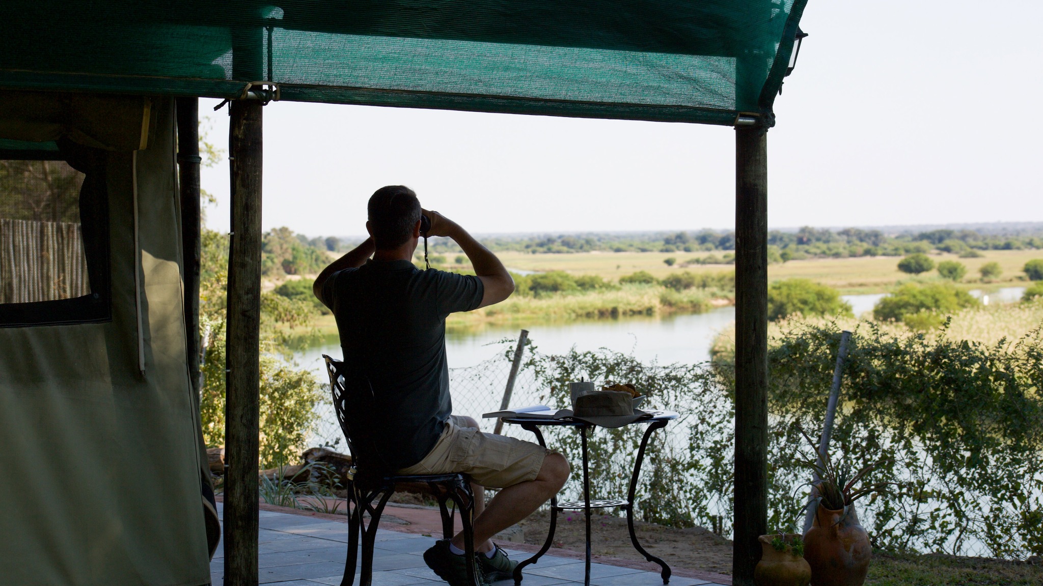 Covered patio overlooking the river