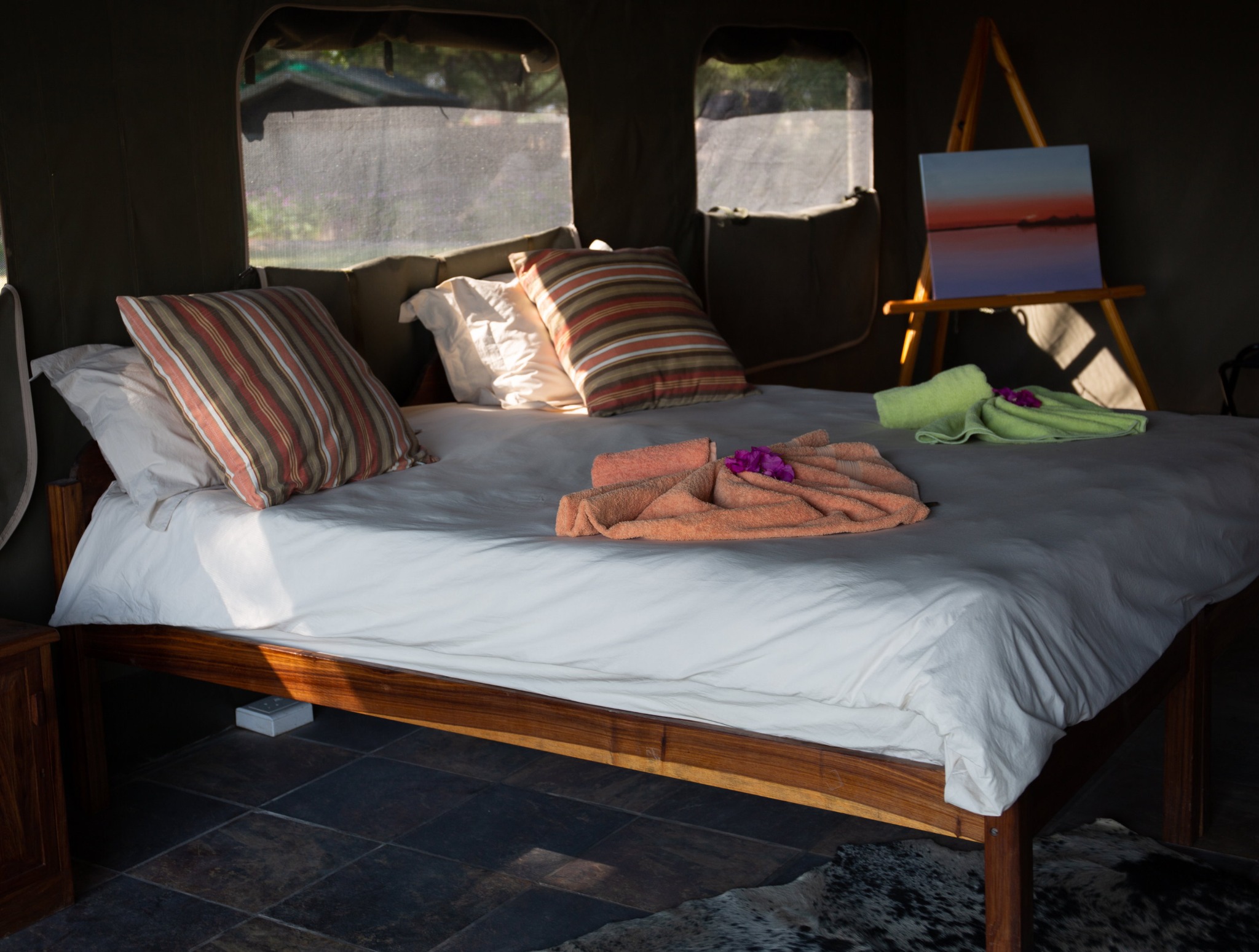 Double bed inside a safari tent