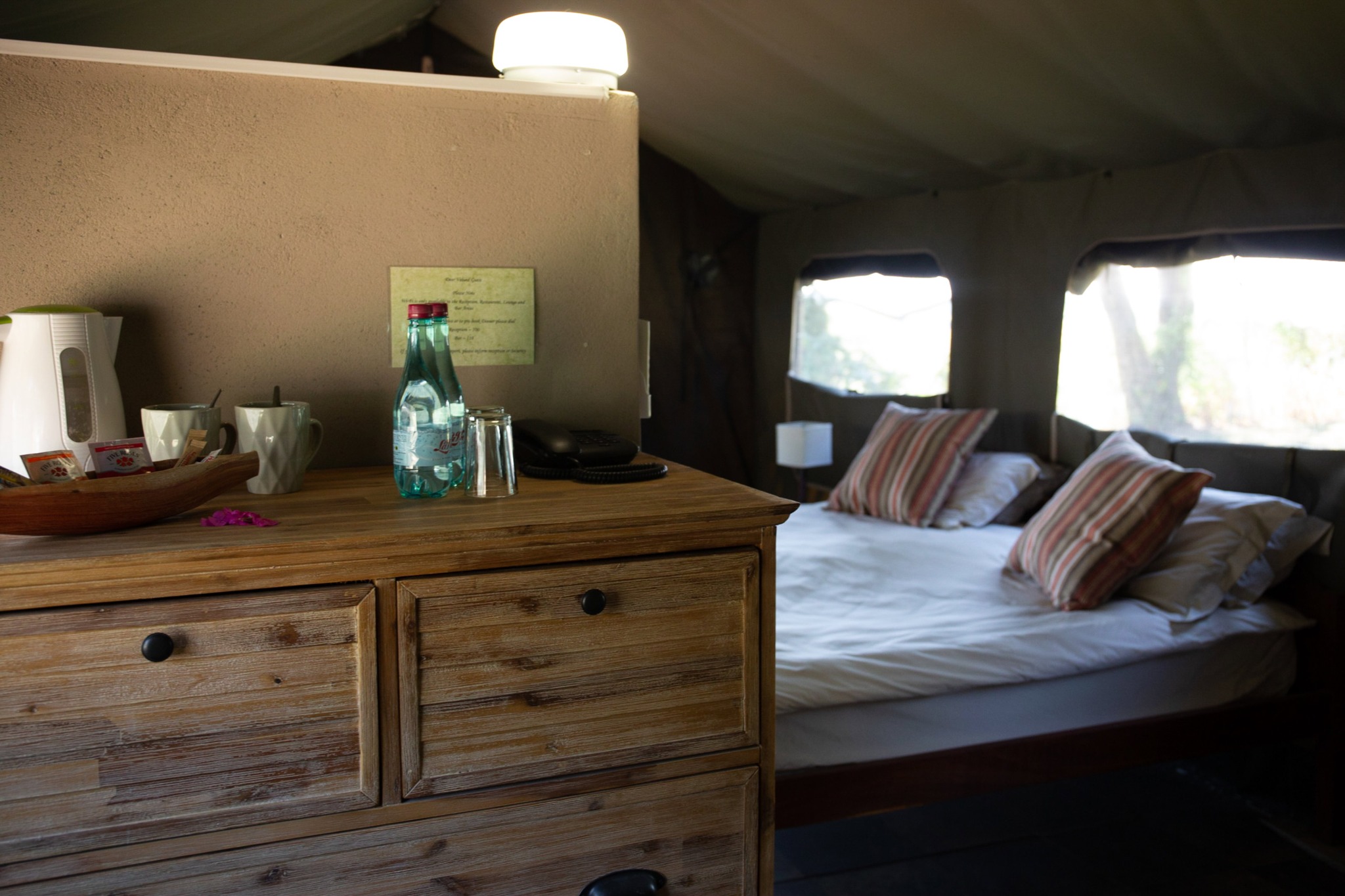 Safari tent bed and chest of drawers with tea station